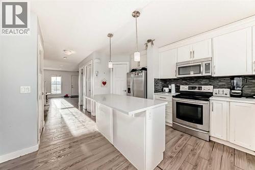 366 Auburn Bay Avenue Se, Calgary, AB - Indoor Photo Showing Kitchen With Upgraded Kitchen