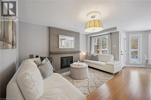 33 Manitoulin Crescent, Kitchener, ON - Indoor Photo Showing Living Room With Fireplace