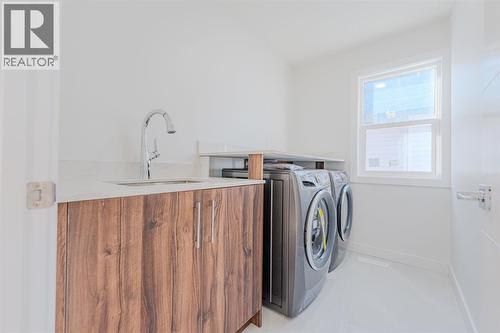1975 Mccaskill Drive, Crossfield, AB - Indoor Photo Showing Laundry Room