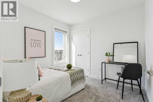 205, 95 Saddlecrest Circle Ne, Calgary, AB - Indoor Photo Showing Bedroom