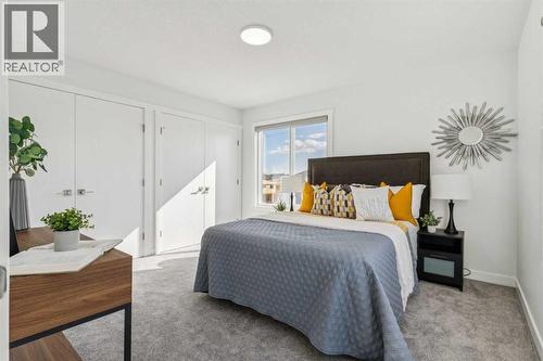 205, 95 Saddlecrest Circle Ne, Calgary, AB - Indoor Photo Showing Bedroom