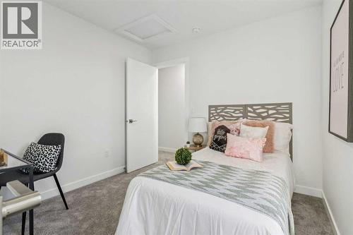 205, 95 Saddlecrest Circle Ne, Calgary, AB - Indoor Photo Showing Bedroom