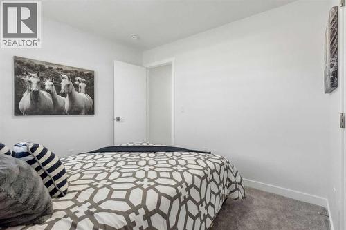 205, 95 Saddlecrest Circle Ne, Calgary, AB - Indoor Photo Showing Bedroom