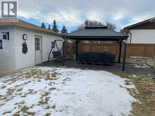 Garage and patio - 6311 Pineridge Road Ne, Calgary, AB - Outdoor