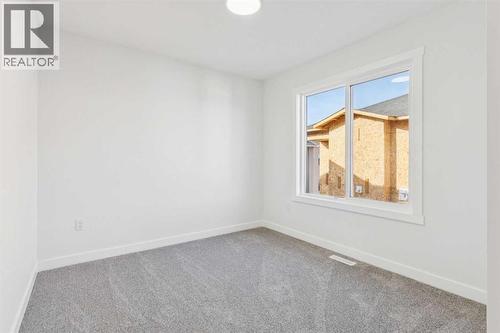204, 95 Saddlecrest Circle Ne, Calgary, AB - Indoor Photo Showing Other Room