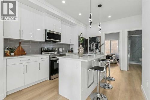 204, 95 Saddlecrest Circle Ne, Calgary, AB - Indoor Photo Showing Kitchen With Upgraded Kitchen