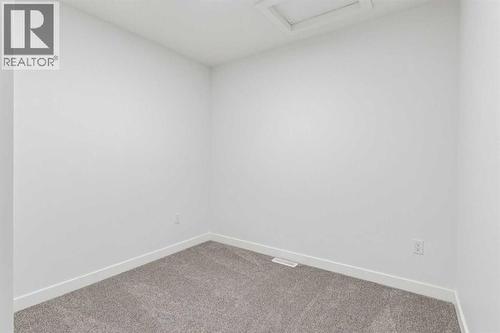 204, 95 Saddlecrest Circle Ne, Calgary, AB - Indoor Photo Showing Other Room