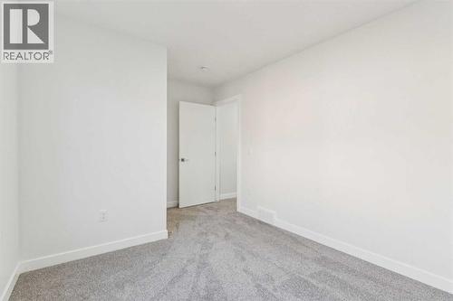204, 95 Saddlecrest Circle Ne, Calgary, AB - Indoor Photo Showing Other Room