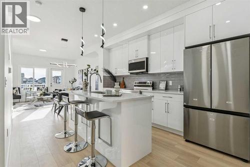 204, 95 Saddlecrest Circle Ne, Calgary, AB - Indoor Photo Showing Kitchen With Stainless Steel Kitchen With Upgraded Kitchen