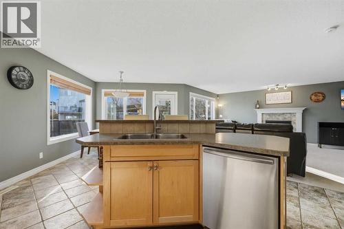 291 Springmere Link Sw, Chestermere, AB - Indoor Photo Showing Kitchen With Double Sink