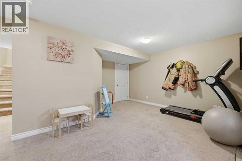 291 Springmere Link Sw, Chestermere, AB - Indoor Photo Showing Gym Room