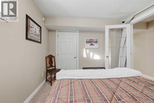 291 Springmere Link Sw, Chestermere, AB - Indoor Photo Showing Bedroom