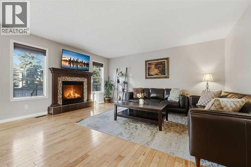 307 Valley Crest Court Nw, Calgary, AB - Indoor Photo Showing Living Room With Fireplace