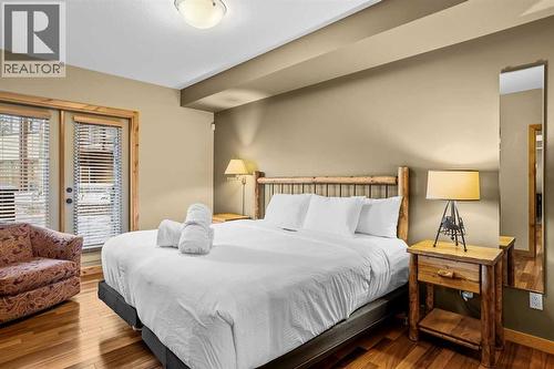 112, 379 Spring Creek Drive, Canmore, AB - Indoor Photo Showing Bedroom