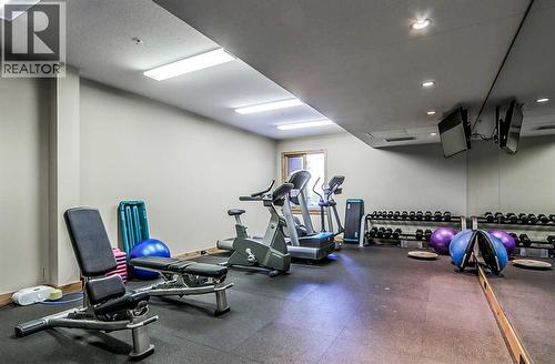 112, 379 Spring Creek Drive, Canmore, AB - Indoor Photo Showing Gym Room