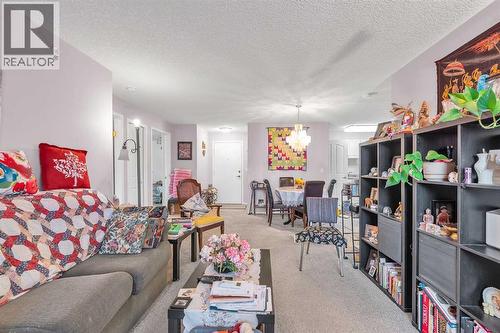 3340, 6818 Pinecliff Grove Ne, Calgary, AB - Indoor Photo Showing Living Room