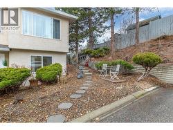 FRONT YARD - Nice sitting area and path to back yard. - 