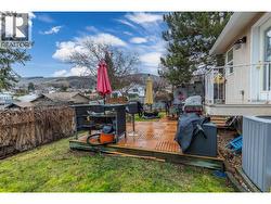 BACK YARD - Generous sized fenced backyard with deck, southern exposure. - 