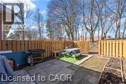 Fenced backyard with a patio area - 