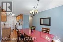 Dining space with a chandelier - 