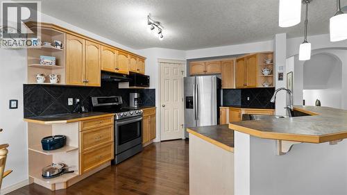 166 Bridlecrest Boulevard Sw, Calgary, AB - Indoor Photo Showing Kitchen With Stainless Steel Kitchen With Double Sink