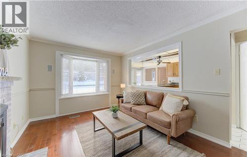 21 Sandcliffe Place, Waterloo, ON - Indoor Photo Showing Living Room With Fireplace