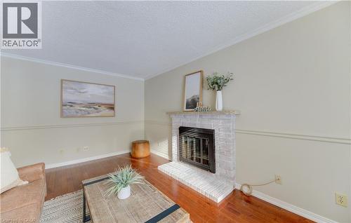 21 Sandcliffe Place, Waterloo, ON - Indoor Photo Showing Living Room With Fireplace