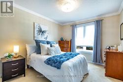 3rd bedroom with crown molding - 