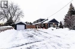View of front facade with  a garage - 