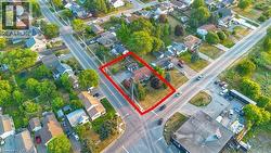 View of property location featuring property parcel outlined and nearby suburban area - 