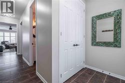 Elegant, spacious front hall way from foyer entry to main living space. Ample front closet. - 