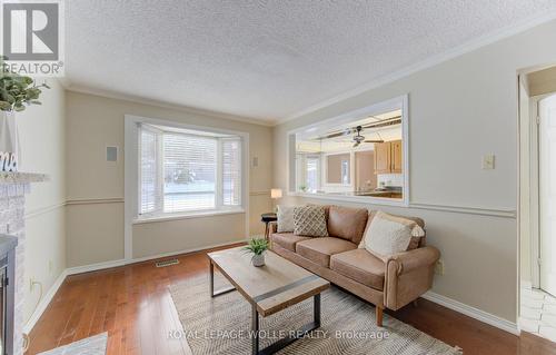 21 Sandcliffe Place, Waterloo, ON - Indoor Photo Showing Living Room With Fireplace