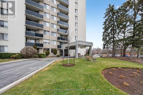 1002 - 81 Millside Drive, Milton, ON - Outdoor With Balcony With Facade