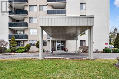 1002 - 81 Millside Drive, Milton, ON - Outdoor With Balcony With Facade