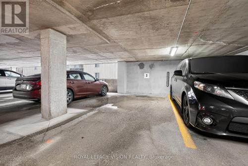 1002 - 81 Millside Drive, Milton, ON - Indoor Photo Showing Garage