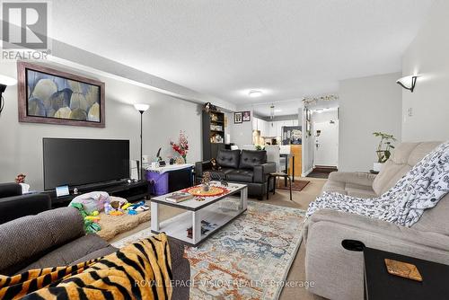 1002 - 81 Millside Drive, Milton, ON - Indoor Photo Showing Living Room