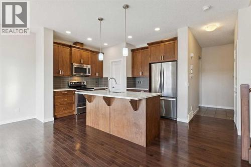 116 Walden Parade Se, Calgary, AB - Indoor Photo Showing Kitchen With Upgraded Kitchen