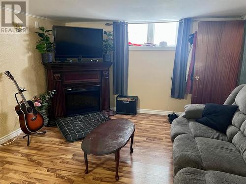 Apartment Living Room - 1 Windsor Place, Grand Falls-Windsor, NL - Indoor Photo Showing Living Room With Fireplace