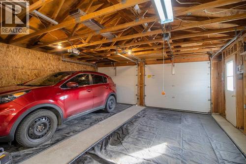 79 Temple Crescent W, Lethbridge, AB - Indoor Photo Showing Garage