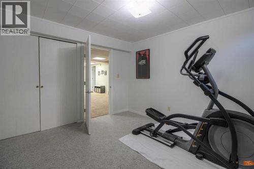 79 Temple Crescent W, Lethbridge, AB - Indoor Photo Showing Gym Room