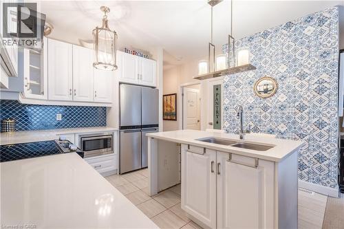7 Comet Lane, Crystal Beach, ON - Indoor Photo Showing Kitchen With Stainless Steel Kitchen With Double Sink With Upgraded Kitchen