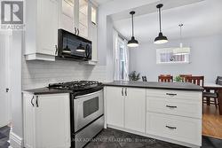 Island open to large dining room - 