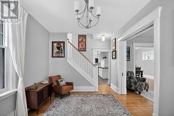 Greet your guests with this large front foyer. - 