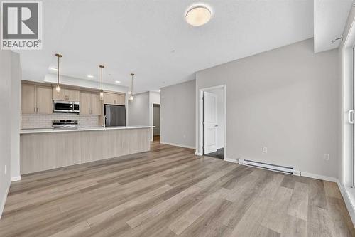 1106, 33 Carringham Gate Nw, Calgary, AB - Indoor Photo Showing Kitchen