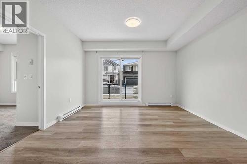 1106, 33 Carringham Gate Nw, Calgary, AB - Indoor Photo Showing Other Room