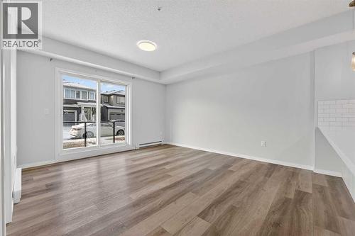 1106, 33 Carringham Gate Nw, Calgary, AB - Indoor Photo Showing Other Room
