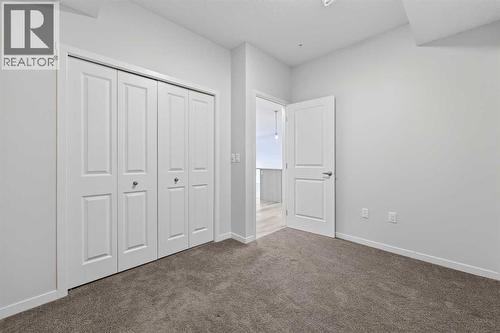 1106, 33 Carringham Gate Nw, Calgary, AB - Indoor Photo Showing Other Room