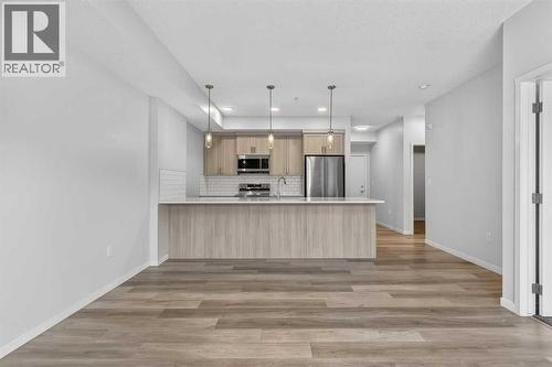 1106, 33 Carringham Gate Nw, Calgary, AB - Indoor Photo Showing Kitchen