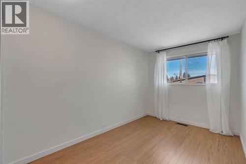2nd bedroom onmain floor - 3404 35 Avenue Se, Calgary, AB - Indoor Photo Showing Other Room