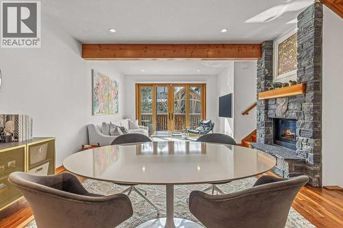 4, 511 6Th Avenue, Canmore, AB - Indoor Photo Showing Living Room With Fireplace